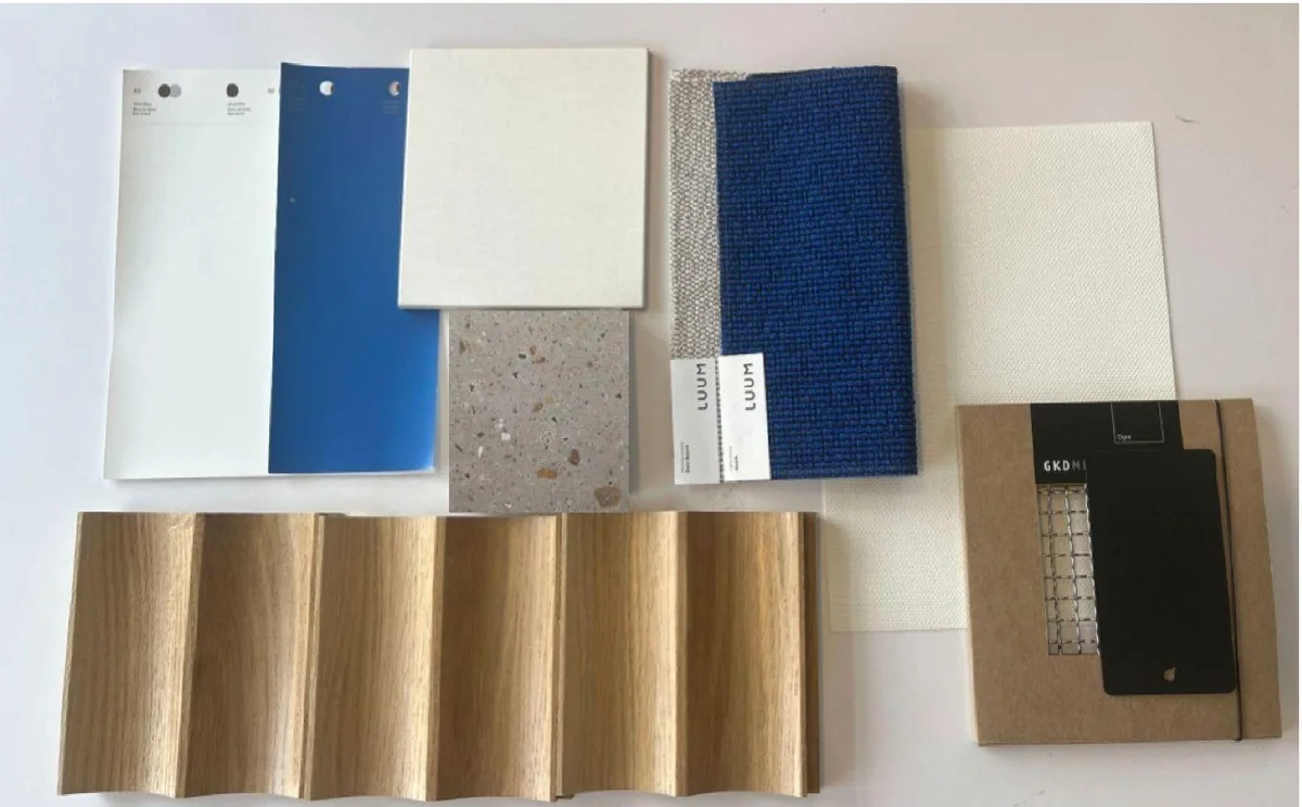Material samples in blue, white, terrazzo and fluted wood