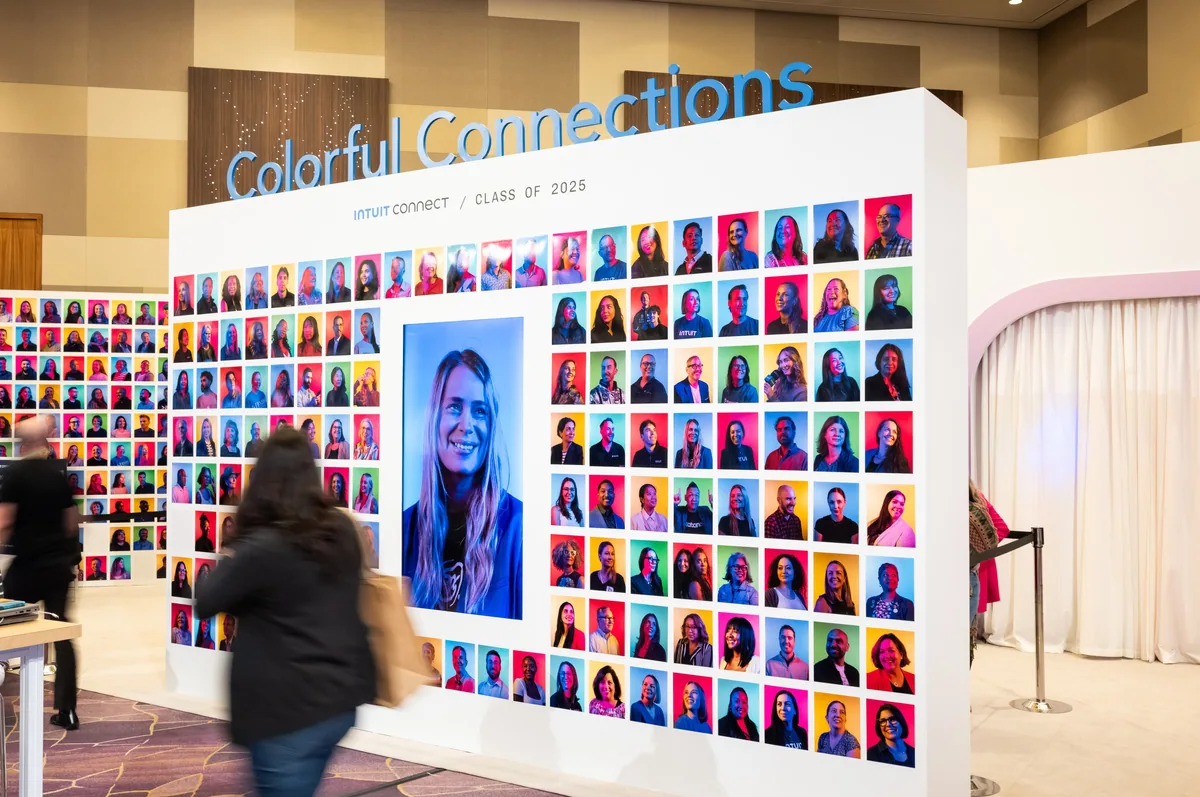 Colorful Connections wall of attendee portraits